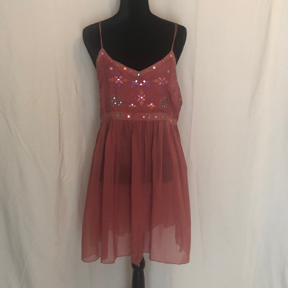 Used little shear mini dress.  Fair but good shape